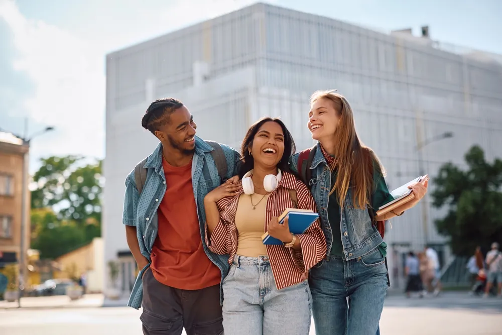 Learners talking together outside the institute